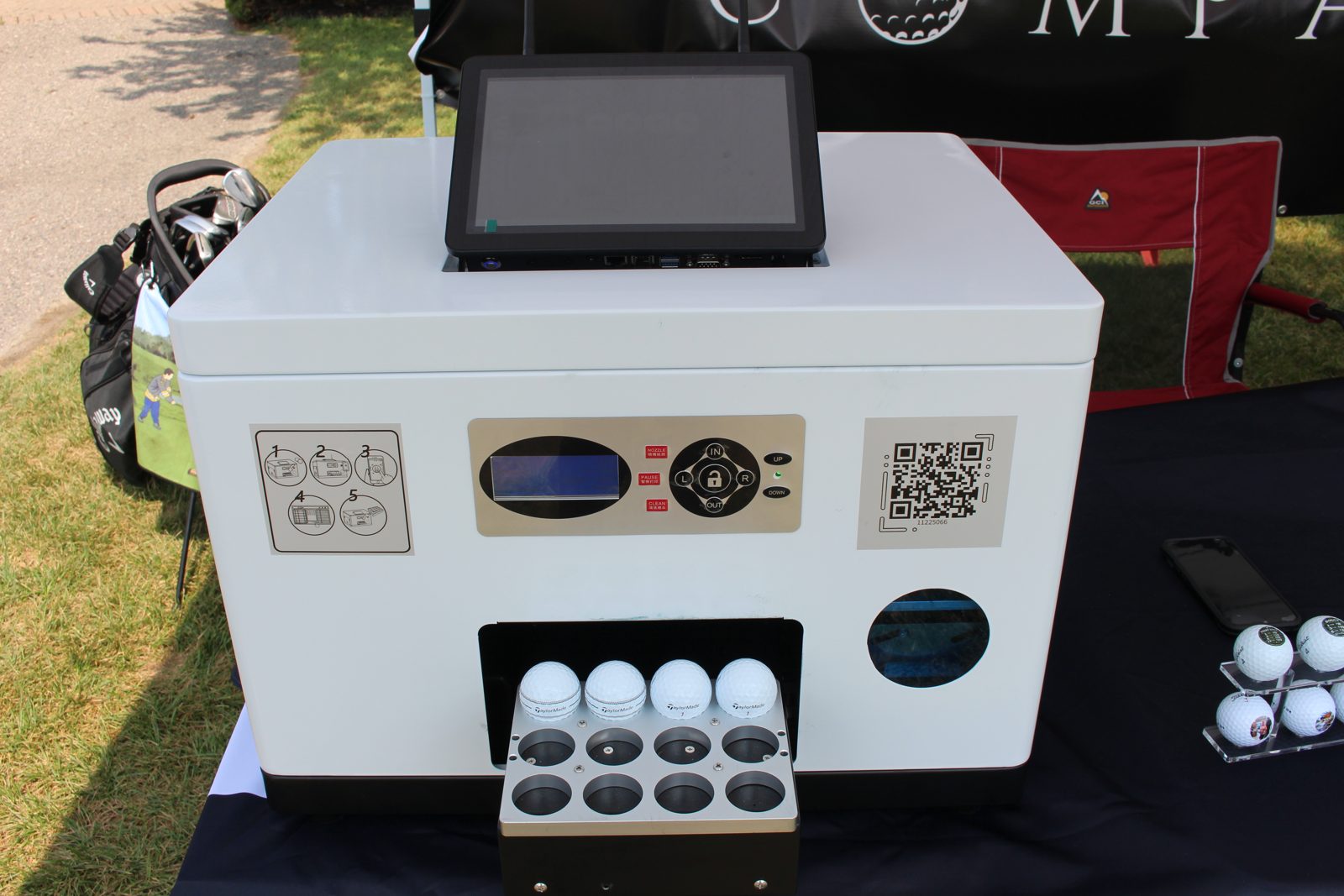 On-site golf ball printer loaded with balls